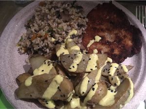 Seitan beef with mushroom rice and potatoes at Enjoy Vegan in Barcelona