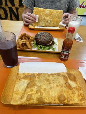 Pastel with calabresa and cheese + Marcus Garvey burger (beetroot burger)  at Mount Zion Vegano in Sao Paulo