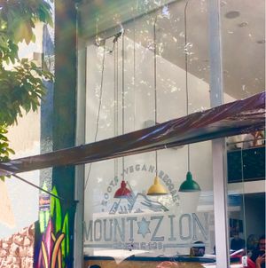 Outdoor seating is really pleasant on a sunny day  at Mount Zion Vegano in Sao Paulo