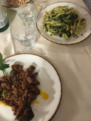 Seitan peposo and kale pesto pasta at Trattoria Enzo e Piero in Florence