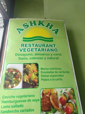 Sign in doorway at Ashkha in Arequipa