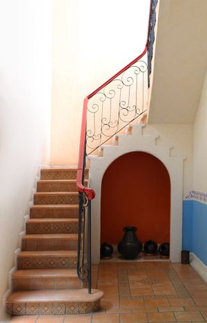Front staircase at Hotel MedioMundo in Merida