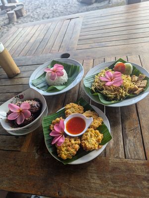 Corn fritters, fried noodles, the tempe meatballs and a plain rice at Coco Beach in 