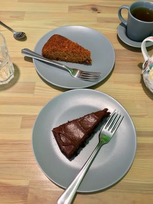 Vegan chocolate orange cake and vegan carrot cake at Roots Vegetarian Cafe in Lancaster