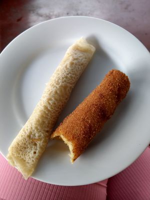 pancake stuff with coconut and kind of crepe stuff with spicy potato and breaded at The Soya Centre in Kandy