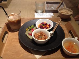 vegan dinner course with iced soy latte at Cosme Kitchen Cafe in Kyoto