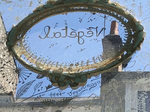 Look under the word 'Végétal" above the restaurant door and you will see "veganage" written both left to right and right to left.  at Un Piano dans la Theiere in Orleans