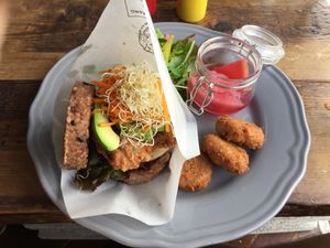 Avocado burger with rice bun  at Organic Table by Lapaz in Tokyo
