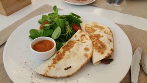 Mexican dish with vegan chees. at El Vergel Veggie Restaurant in Tarragona