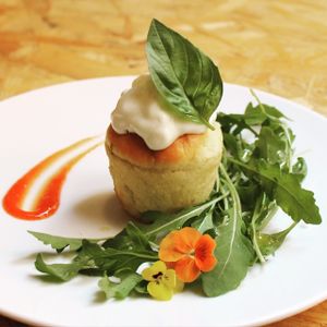 Brioche with basil and arugula pesto, vegan parmesan foam and tomato coulis  at El Vergel Veggie Restaurant in Tarragona