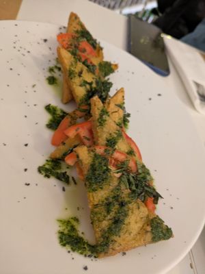 Panelle with tomato at El Vergel Veggie Restaurant in Tarragona
