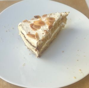 Mandarin cake with cream  at El Vergel Veggie Restaurant in Tarragona