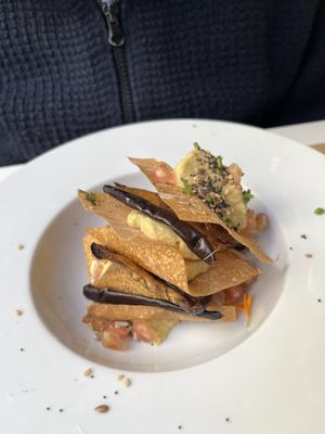 Millefeuille with aubergine, caramelised onions, and pomegranate seeds  at El Vergel Veggie Restaurant in Tarragona