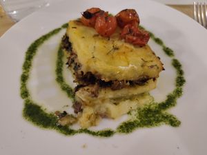 Potato pie with vegan protein and vegetables at El Vergel Veggie Restaurant in Tarragona