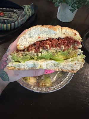 “KUKU Sandwich (Tastes Like Chicken)
Jikoni Kush, onions, celery, relish, mayo, herbs”
*I added lettuce, avocado & bacun   at Jikoni Cafe at The House of Consciousness in Norfolk