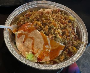 “Full Jikoni Kush Pocket w/ Tamu-Thai sauce
Thailand inspired! Perfect balance of spicy and sweet flavors to tantalize the pickiest of taste buds.”  at Jikoni Cafe at The House of Consciousness in Norfolk