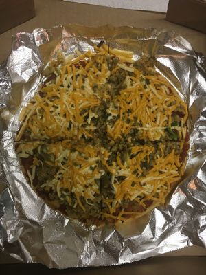 Kush Supreme Pizza at Jikoni Cafe at The House of Consciousness in Norfolk