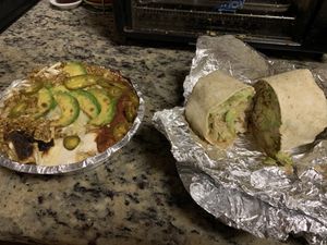 Kush nachos and a burrito  at Jikoni Cafe at The House of Consciousness in Norfolk