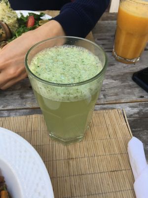 Ginger and mint lemonade//orange, carrot and papaya juice in the background at Vaikuntha Resto in Salta