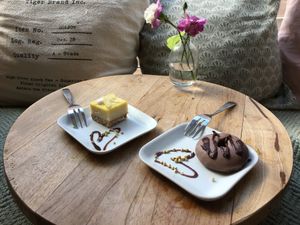Raw cake cube and raw triple chocolate doughnut. at Fern & Fika in Stockholm