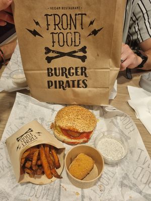 Cheese burger sweet potato fries and one nugget? at Front Food in Linz