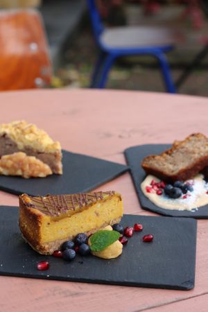 Gluten-free and plant-based sweet treats.  In the front you see the pumpkin spice cheesecake.  at GYS - Voorstraat in Utrecht