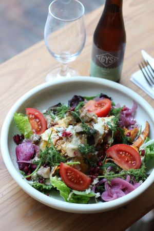 Kapsalon -Little gem, sweet potato, shawarma, eggplant, pomegranate, feta, garlic-mint yoghurt, zhug

 at GYS - Voorstraat in Utrecht