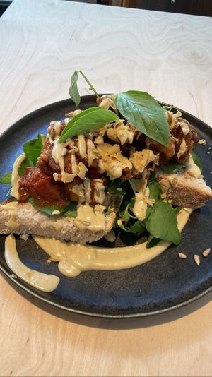 Ruffle my truffle: bread topped with tomato chutney, vegan truffle mayo, vegan Parmesan, herbs, watercress and fried oyster mushrooms. Delicious!   at GYS - Voorstraat in Utrecht