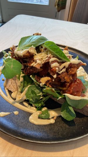 Ruffle my truffle: bread topped with tomato chutney, vegan truffle mayo, vegan Parmesan, herbs, watercress and fried oyster mushrooms. Delicious!   at GYS - Voorstraat in Utrecht