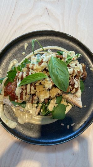 Ruffle my truffle: bread topped with tomato chutney, vegan truffle mayo, vegan Parmesan, herbs, watercress and fried oyster mushrooms. Delicious!   at GYS - Voorstraat in Utrecht