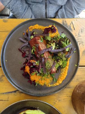 Shroom steak with carrot puree, coriander pesto, roasted corn and broccoli at GYS - Voorstraat in Utrecht