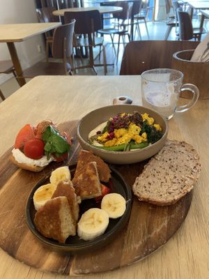 Breakfast platter (huge and only €9,95) with pancakes, tomato focaccia and vegan cilbir. The cilbir was great, the pancakes nice but the ricotta focaccia only decent. The chai with coconut-nut mylk as also only ok. at GYS - Voorstraat in Utrecht
