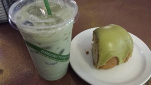 Iced lavender matcha latte with lavender matcha cake at Good Eden in New Orleans