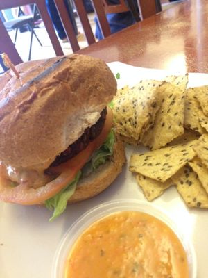 burger w chips and salsa! at Good Eden in New Orleans