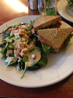 Sandwich & salad with delicious dressing at Good Eden in New Orleans