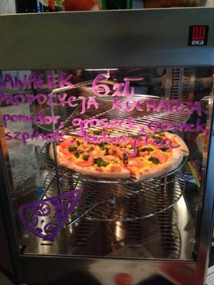 Pizza by slice at Vegan Pizza in Warsaw