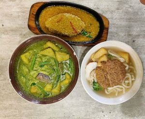 Top: Green Curry Kway Teow Soup, Right: In House Cod Fish, Bottom: Spicy Udon Soup with Fried Chicken at Nature Cafe 自然疏食 - The Aperia in Central Singapore