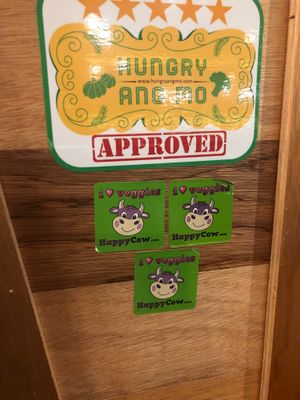 Happy cow stickers :) at Nature Cafe 自然疏食 - The Aperia in Central Singapore