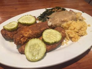 southern spicy fried chick'n with cauli-mashed potatoes ?, corn cake and collard greens  at Veggie Grill by Next Level in Pasadena