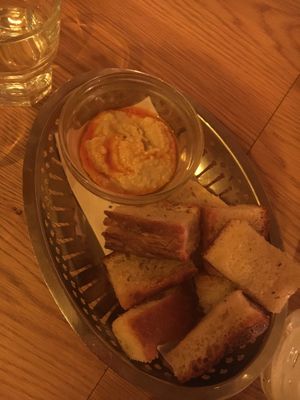 Focaccia looking bread with hummus dip (also got a GF option of bread, as well as a own dip for the GF bread) at ONDA in Helsinki