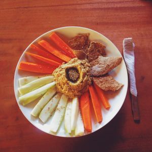 hummus, cucumber, carrots and crunchy bread at Cosmic Cocina in Playa El Esteron