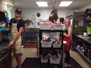 The kitchen volunteers, including the cafe manager Rachel on the right. at World Peace Cafe in Baltimore