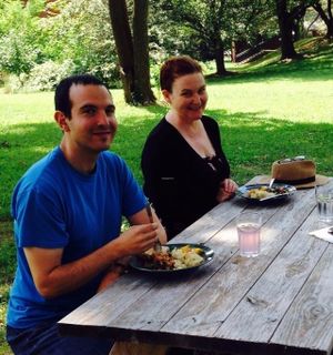 Enjoying the outdoor seating at picnic tables at World Peace Cafe in Baltimore