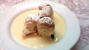 Famous vegan dessert from Austria filled with plumb jam, served with vanilla sauce (not always available) at Gasthaus am Predigtstuhl in Vienna