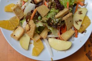 Raw salad with nuts, fruits and sauteed tofu  at Gasthaus am Predigtstuhl in Vienna