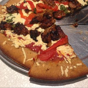 GF crust, red sauce, roasted peppers, caramelized ognions, tempeh and vegan cheese at Mellow Mushroom in Clearwater