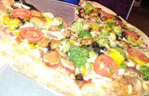 Spinach, tempeh, olives, tomatoes, banana peppers mushrooms, onion, and vegan cheese! at Mellow Mushroom in Clearwater