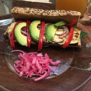 Horneado sandwich - baked zucchini, eggplant, red pepper, spinac  and red onion with hummus and chipotle vegan mayo. $71   at Co.ConAmor in Tulum