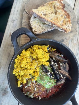 Rainbow hash with scrambled tofu, sourdough and vegan butter.  at The Garden in Hale