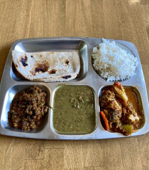 Naan with spicy cauliflower, curry dhal and chana masala 🌶  at Thali - Dunajska in Bratislava